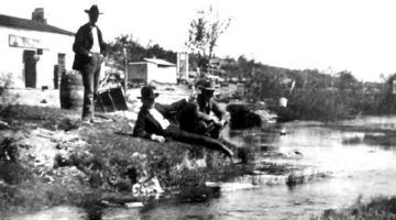 Relaxing in front of Koehler's Store along Comanche Springs, circa 1900